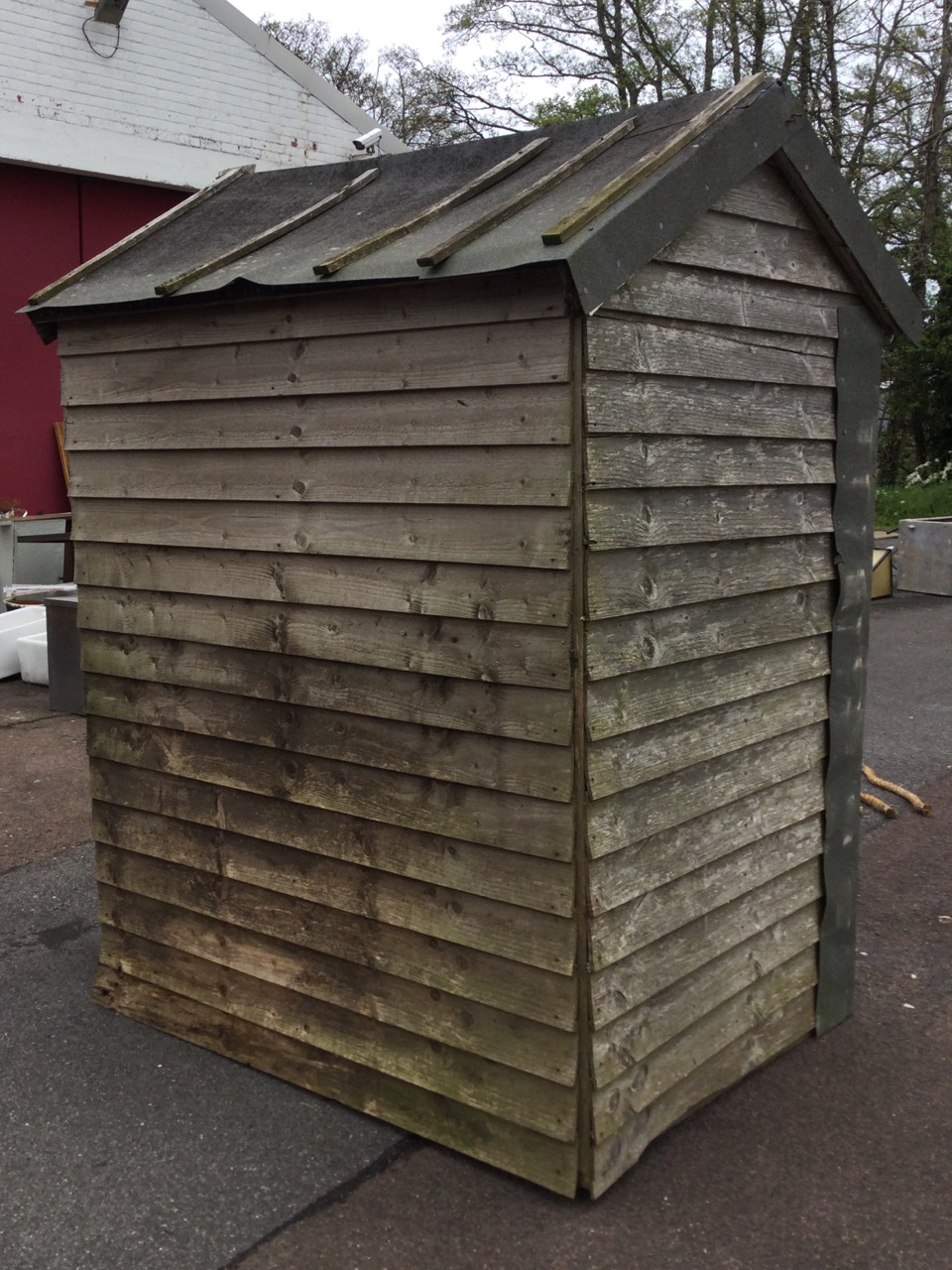 A lap-boarded garden shed with pitched felt roof, having hinged door - A/F. (45.5in x 58in x 80in) - Image 3 of 3