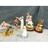 An Italian Capo-de-Monte porcelain group of two girls on gilt metal stand; a Spanish porcelain