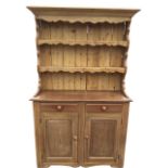 A married pine & satin walnut dresser, the delft rack with moulded cornice having shaped waved apron