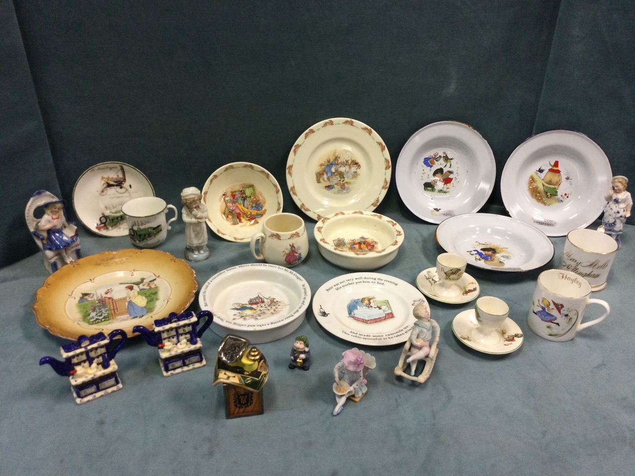 Miscellaneous childrens ceramics including a porcelain christening tankard dated 1863, a pair of
