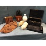 A leather gladstone bag; three stoneware hotwater bottles; a leather mounted document box with