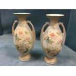 A pair of late nineteenth century Staffordshire Sanford Ware ovoid vases with stylised handles and
