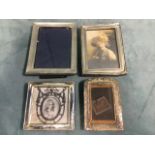 Four miscellaneous hallmarked silver frames - Chester, floral embossed on oak, 925 moulded, etc. (