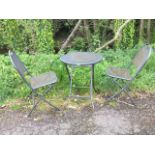 A Kettler folding garden table and chair set with circular table and arched-back chairs, all with