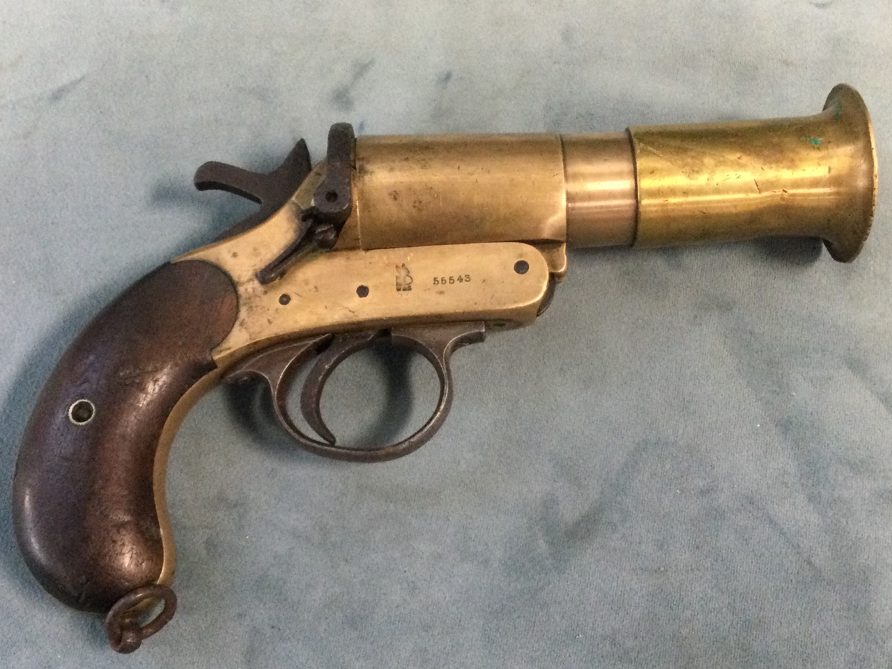 An Edwardian brass Webley & Scott 1in flare pistol with mahogany handle; and another similar in - Image 3 of 3
