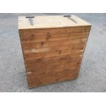 A tongue & grooved rectangular pine box, with strap hinges to lid. (32in x 18in x 37.75in)