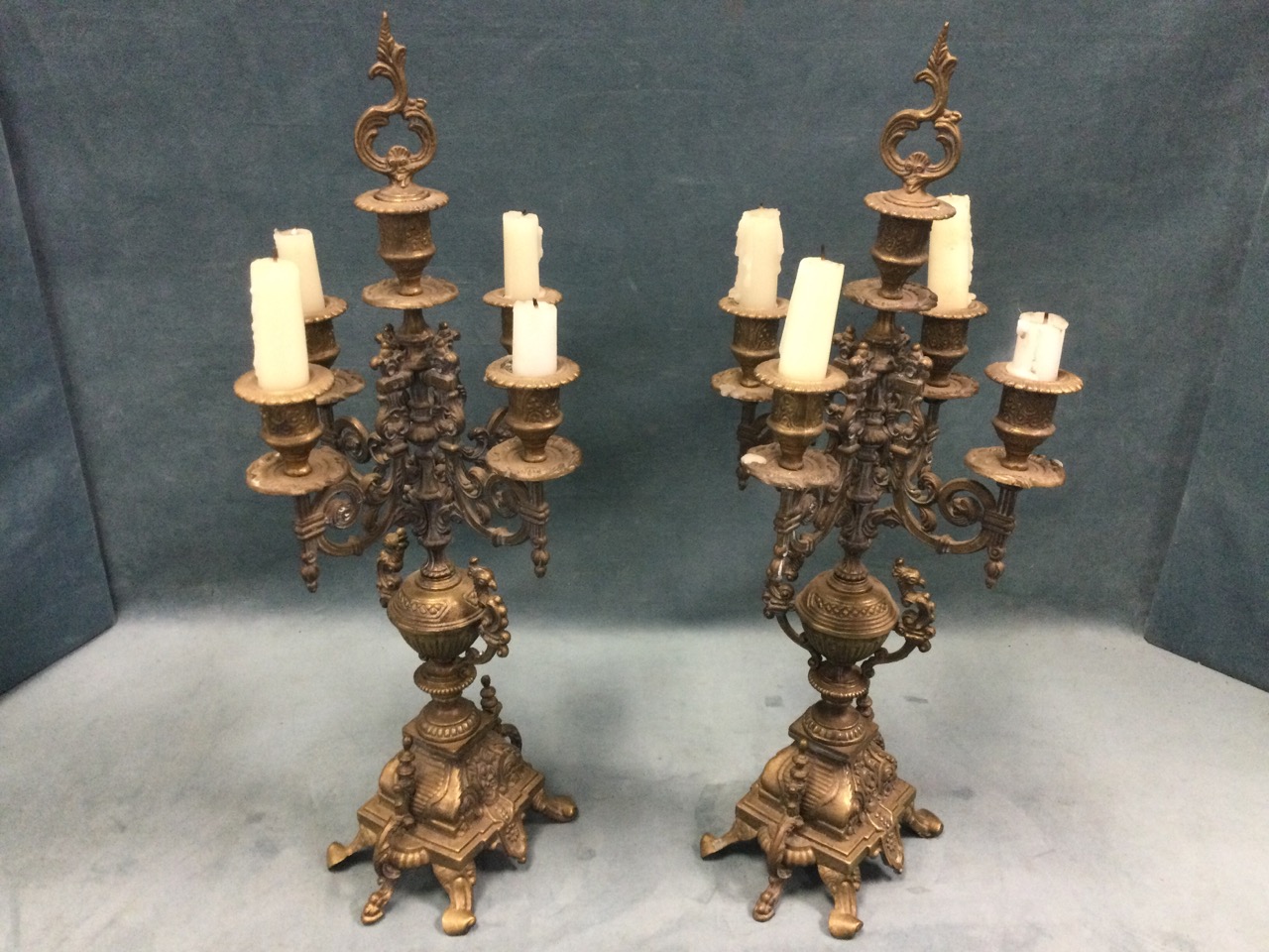 A pair of brass candelabra each with four scrolled branches on decorative urn columns with - Image 2 of 3
