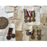 A family group of medals with trio awarded to Pte G Hodge (17988) of the Bedford Regiment, a pair