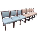 A set of three stained dining chairs, the backs with ribbed stiles framing upholstered panels,