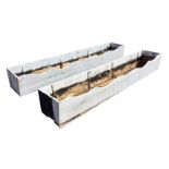 A pair of painted rectangular wood plant troughs, with scalloped front rims. (94.5in) (2)