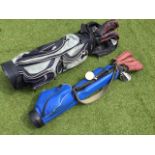Two golf bags containing miscellaneous clubs - Ryder set, St Andrew Golf Co drivers, a brass head