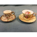A Royal Worcester blush ivory teacup & saucer painted with flowers on peach ground with gilt rims;