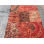 A modern Kokoon rug designed with patchwork panels of classical carpets with scrolled floral