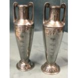 A pair of secessionist style European classical vases of tapering shape having scrolled handles