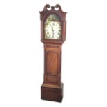 A nineteenth century country oak longcase clock, the swan-neck pediment with brass roundels above an