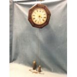 An octagonal nineteenth century rosewood wallclock with scroll brass inlay to case, the painted wood