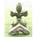 A Victorian sandstone finial with leaf carved cruciform on scrolled supports having circular collar,
