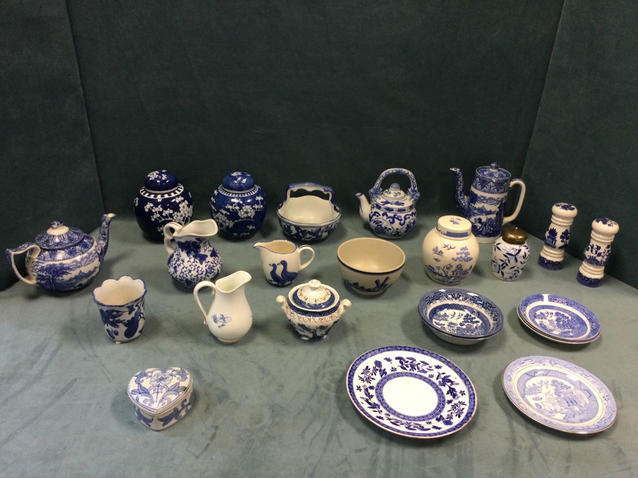 Miscellaneous blue & white ceramics including teapots, a pair of ginger jars & covers, jugs,