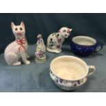 A Plichta ceramic cat set with glass eyes decorated with clover; another cat by the Griselda Hill