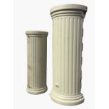 Two Titan rainwater tanks in the form of fluted columns with moulded plinths - circular & semi-