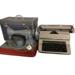 An Imperial manual typewriter; and a cased Jones cast iron sewing machine. (2)
