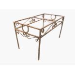 A rectangular wrought iron plant table base, the frieze with scrolled decoration mounted with