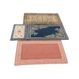 Four modern rectangular rugs - traditional floral, brick-red with greek key band, small prayer