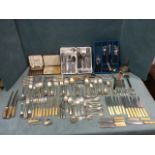 A large quantity of European silver, silver plated and stainless steel cutlery including sets of