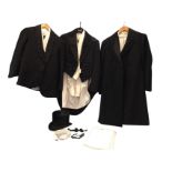 A quantity of gentlemans clothing including a Christys top hat, mourning and evening dress coats