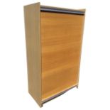 A tambour fronted contemporary filing cabinet, the shutter revealing shelves and file hanging rails.