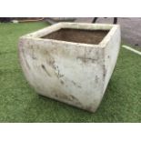 A square garden planter, the bulbous pot with roughcast rim. (15in x 15in x 13in)