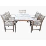 A teak Canterbury Collection garden table and chair set, the rectangular table with slatted top