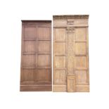 A section of faux oak limed panelling with blind fretwork decoration to central pillar, having