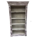 An architectural style painted set of open shelves, with moulded cornice above five platforms framed