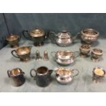 Miscellaneous silver plate including a hammered three-piece teaset, vases & bowls, cruets, etc. (A