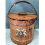 A leather mounted bucket with steel liner having swing handle, the cover with button handle to