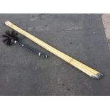 A set of seven chimney/drain cleaning rods with brush, etc; and a dozen long 10ft rods with brass