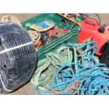 A box of ratchet straps; a crank handle winch; two petrol cans; an electric inspection light; a