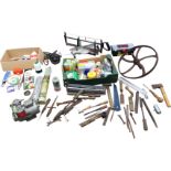 Miscellaneous tools including electrical equipment, a mitre saw on stand, bulbs, a cast iron