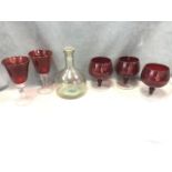 Five large ruby glass vases with clear bases; and a ships style decanter & stopper. (6)