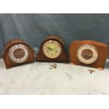 Three mantle clocks with Smiths movements striking on gongs having dials under convex glass - two