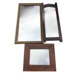 An oak framed mirror with chequered boxwood & ebony banding to wide frame; a contemporary gilt