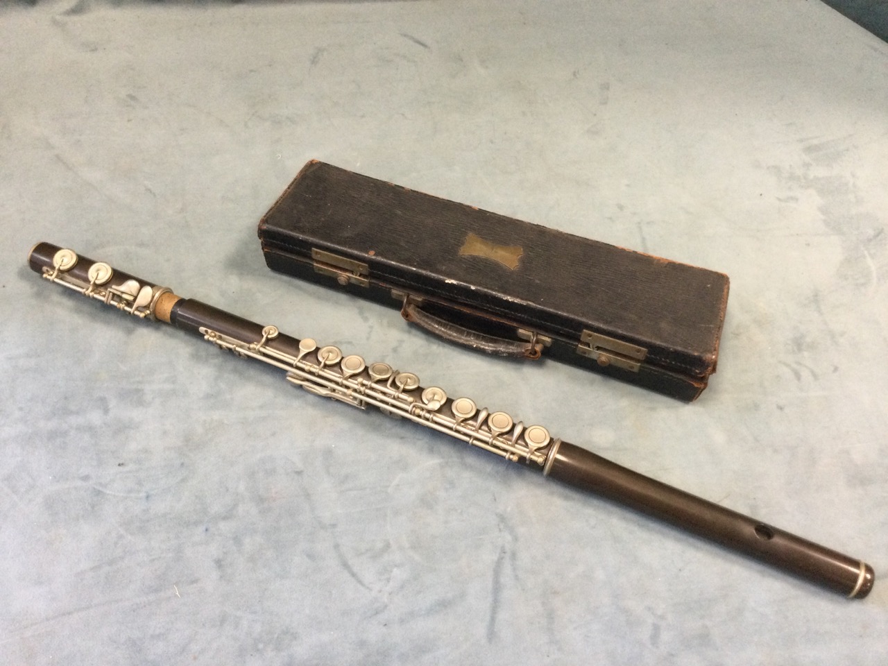 An Edwardian cased flute, the bakelite instrument with chromed mounts - rubbed marks. (26.5in) - Image 3 of 3