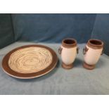 A large studio pottery circular stoneware platter with scraffito decoration to slip glaze; and a