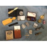 Miscellaneous collectors items including a leather cased gentlemans vanity set, a coin case with