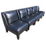 A set of five contemporary leather chairs forming a sofa, with cushion backs and deep sprung