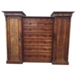 A large Victorian country house mahogany sentry wardrobe, the two tall hanging cupboards with