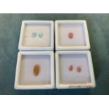 Four boxed/cased loose stones - a pair of cushion-cut larimar stones - 1.2 carats, an Oregon sunrise