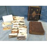 A leather bound edition of Pilgrims Progress; a leather bound family bible with brass mounts; and