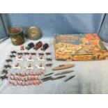 A tin of metal toy soldiers, some mounted, guardsmen, beefeater type, etc; three early Dinkey